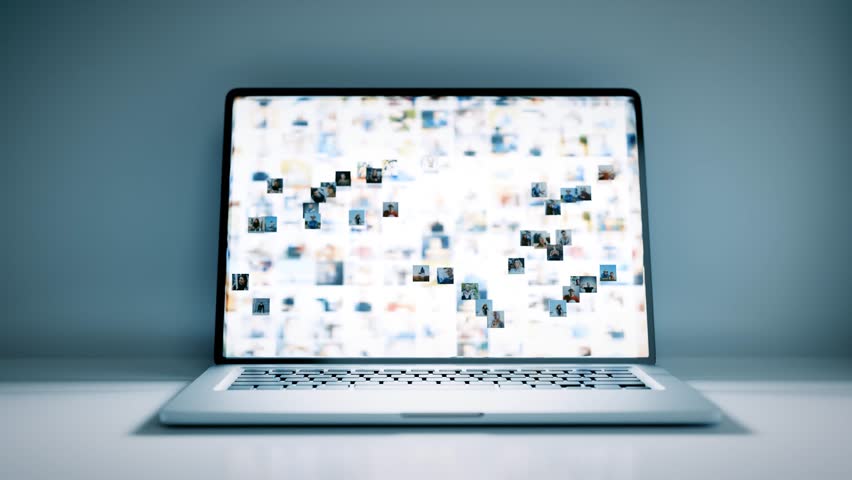 Profile pictures flying from laptop screen, illustrating social media connections