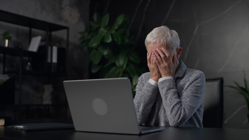 Senior woman distressed over social security collapse