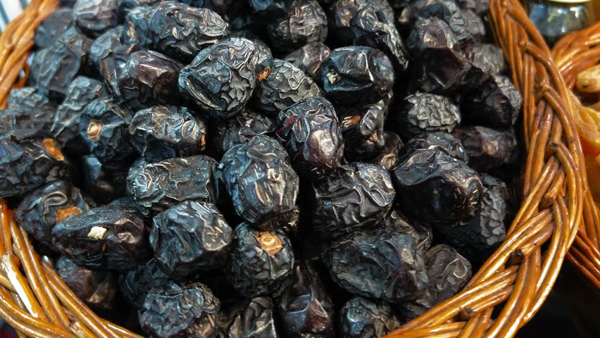 Dried blue berries in display at an Afghani store.