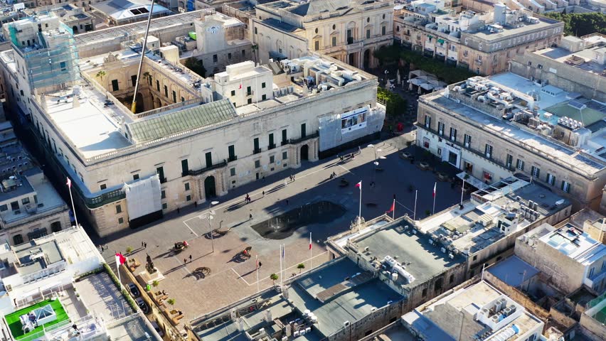Aerial orbiting shot of St George Square in old town Valletta, Malta drone