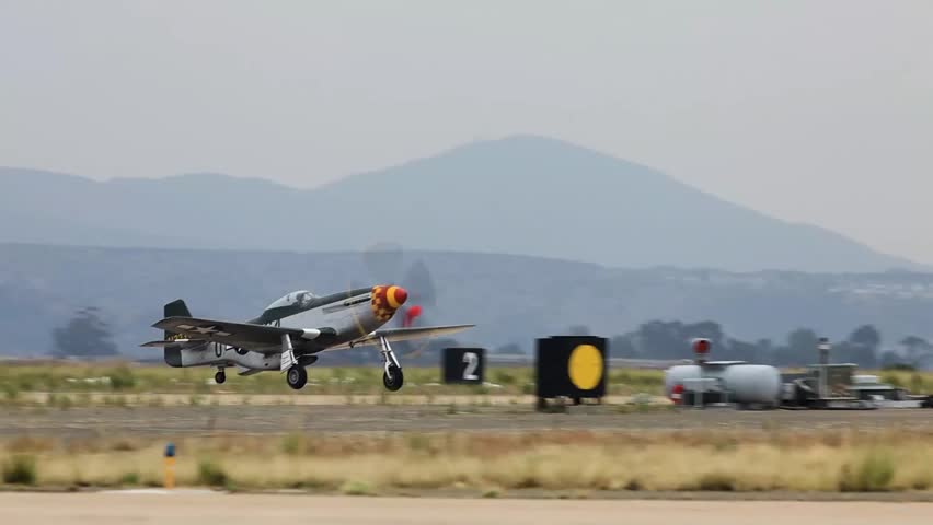 F-16 Fighting Falcon and P-51D Mustang flight, during the Marine Corps Air Station Miramar Airshow