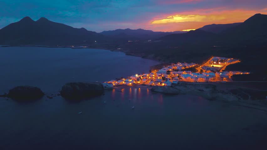 Aerial night view of La Isleta del Moro, Cabo de Gata-Níjar Natural Park, Almeria, Andalusia, Spain