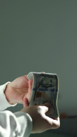  Man hold us money, counting one hundred dollar bills. Saving concept. High quality FullHD footage