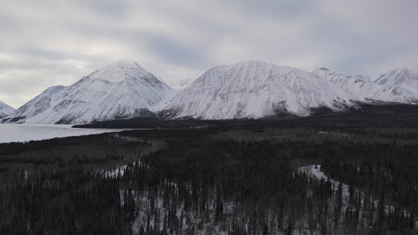 Snow Mountains Of Kathleen Lake In Kluane National Park And Reserve In Yukon, Canada. Aerial Wide Shot