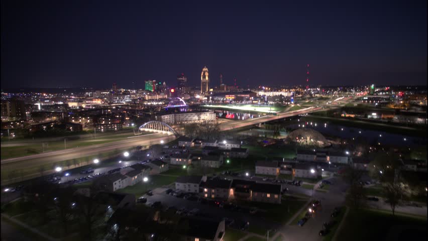 Enjoy this hyperlapse of the Des Moines skyline! Our aerial timelapse captures the vibrant night time scene of light streaks.