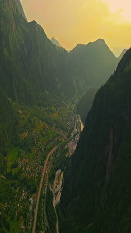 Drone view of Chamonix. Chamonix-Mont-Blanc is a resort town in France near the border with Switzerland and Italy. It is located at the foot of Mont Blanc, the highest peak in the Alps
