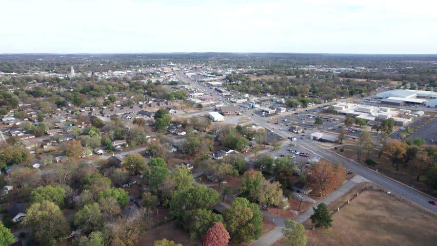 Wide angle drone shot of Claremore, Oklahoma. Small town, USA along Route 66