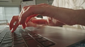 Macro close up of Unknown businesswoman opening laptop, taking coffee mug and start working with hands typing on computer keyboard at office desk in morning. Programming, marketing business. - Powered by Shutterstock - Get 15% off with code: PIKWIZARD15