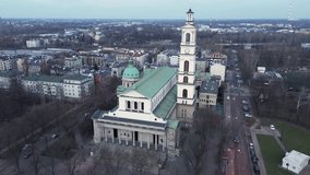 As the camera pans, the exterior details of the basilica come into sharp focus, with its pillars and domes outlined against the deepening blue sky. - Powered by Shutterstock - Get 15% off with code: PIKWIZARD15