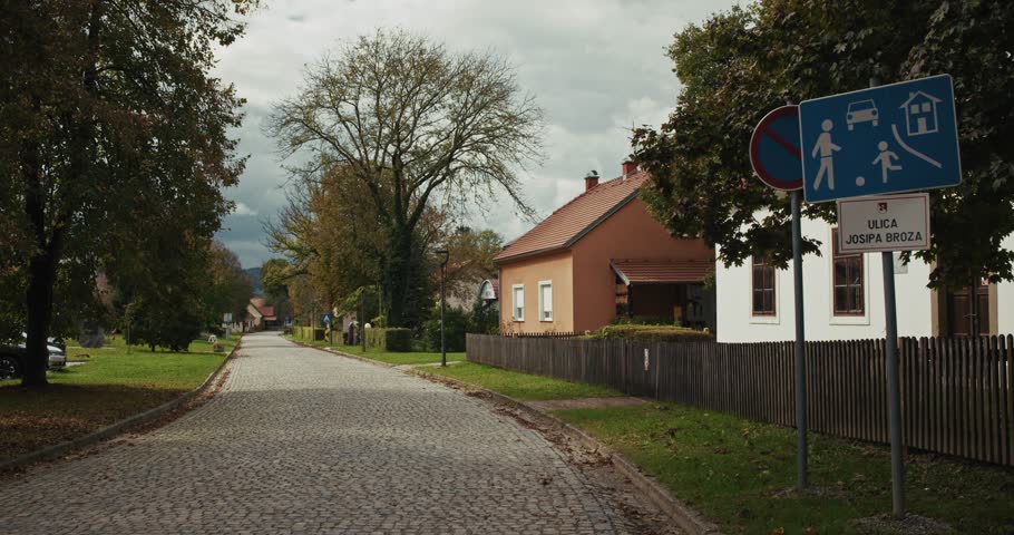 Quiet cobblestone street in Kumrovec village on Josip Broz Street, Croatia