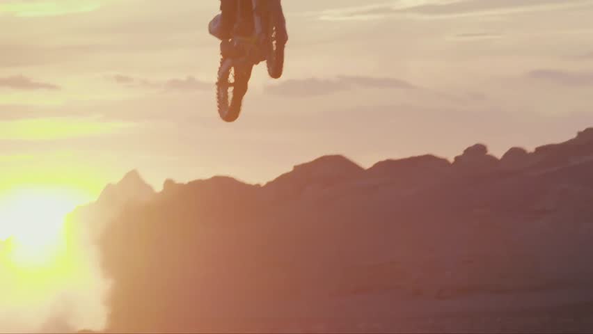 Video of No 225 motorcycle rider jumping into the air