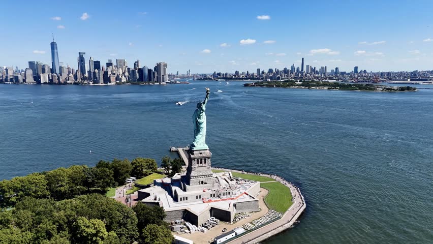 The Statue of Liberty with the New York and New Jersey downtown cityscape in the background. USA