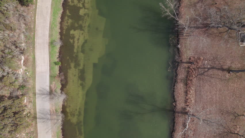 Top Down aerial view following the Blanco River near Blanco, Texas in the Hill Country