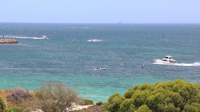 Boats crossing paths at Whitfords Beach, Perth Australia