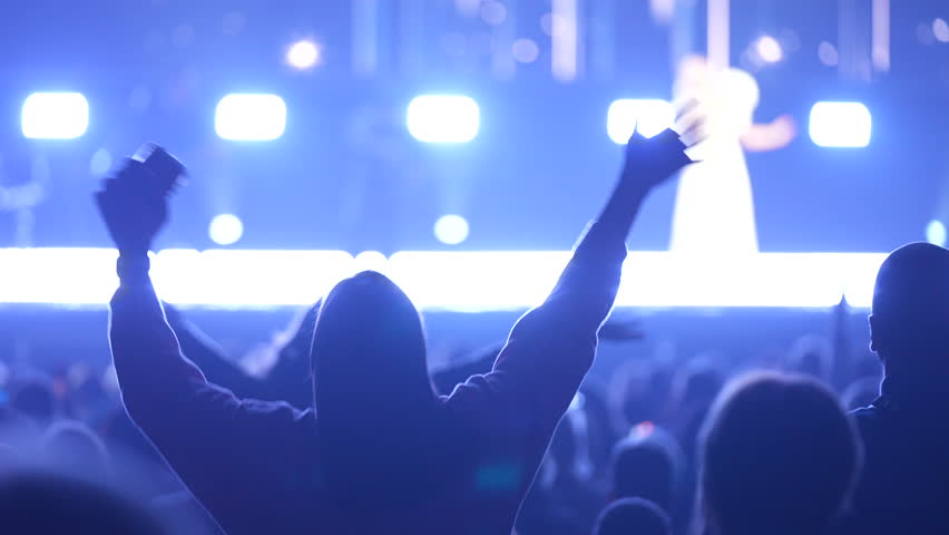 Lot teens dance kpop music concert. Many girls fans cheering fun party. Joy crowd teenagers hang out cool night life fest, k pop chill. Epic live arena. Neon light. People enjoy song. Dancer energy.