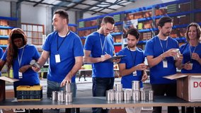 Food Bank Volunteer Community Packing Donation. Non Profit Aid And Support - Powered by Shutterstock - Get 15% off with code: PIKWIZARD15