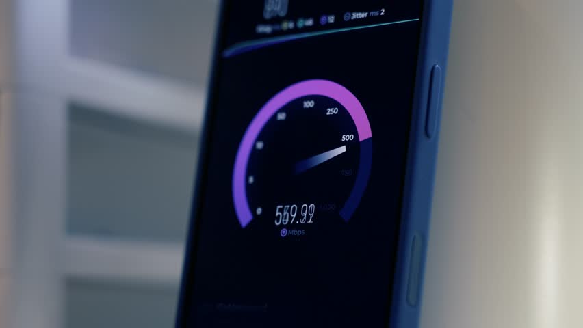 A closeup view of a user testing his 1 gig internet speeds on his smartphone.	