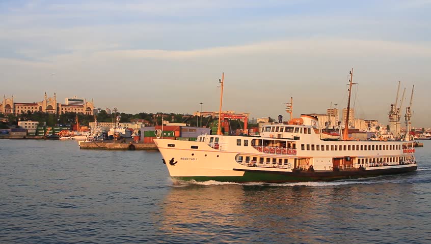 Istanbul ferry sailing in front of Haydarpasa docks
