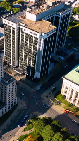 Buildings and architecture of the city of Albany, New York. Aerial view from above on the street. Vertical video.