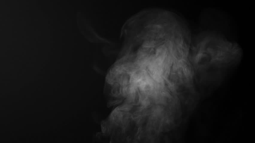 Steam, smoke, vapor isolated on black background. Smoke steam spray, abstract vaporing water, texture of cold mist, hot vapor, fog effect closeup, black screen. Hot food, drink. Slow motion 