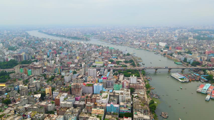 Aerial over Dhaka City, Bangladesh, with Babubazar Bridge and Buriganga river
