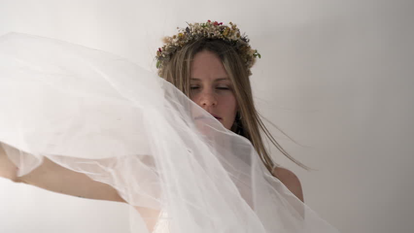 Camera tracks in as the bride