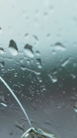 raindrow behing the window in the afternoon 