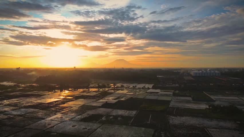 sunset with views of rice fields and coral mountains
banten, Indonesia