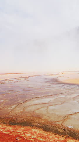 Explore the breathtaking beauty of Yellowstone National Park, which showcases its diverse geothermal features, stunning landscapes, and vibrant colors that attract visitors yearround