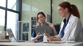 Medical team analyzing x-ray results on digital tablets, healthcare technology and professional diagnosis for medical care. - Powered by Shutterstock - Get 15% off with code: PIKWIZARD15