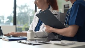Medical Team Using Digital Tablet for Healthcare, Doctor Technology, X-Ray Analysis. - Powered by Shutterstock - Get 15% off with code: PIKWIZARD15
