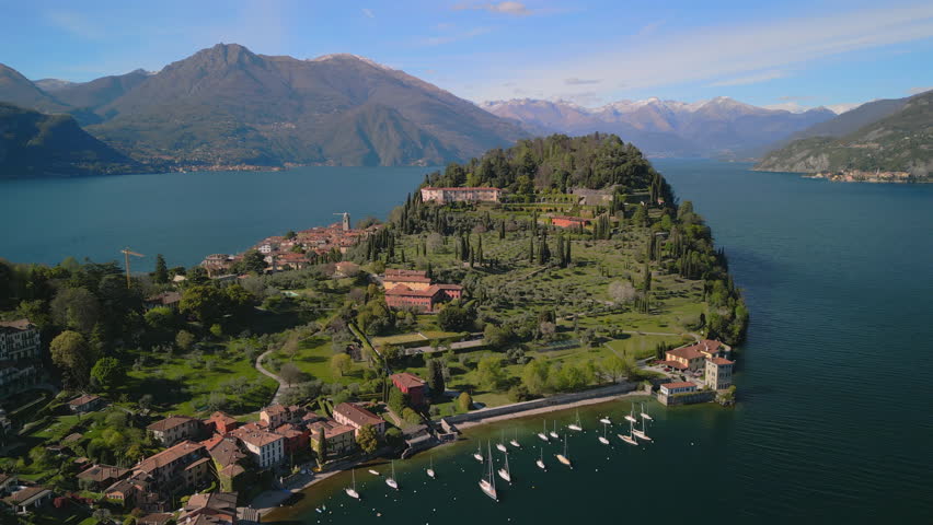 Breathtaking drone shot of Lake Como in Italy, featuring lush green landscapes, peaceful waters, and picturesque Bellagio village, luxury travel and lifestyle in Europe, EU