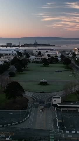 Top-down aerial drone shot of the surroundings of the former Alameda Naval Base, showing remnants of its military past.
