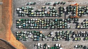 An aerial view of a moving gantry crane surrounded by transformers at Maddox Industrial Transformer in South Carolina. - Powered by Shutterstock - Get 15% off with code: PIKWIZARD15