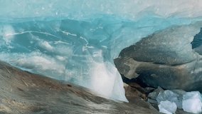 Inside melting blue ice cave, Great Aletsch Glacier up close, Alps, Switzerland - Powered by Shutterstock - Get 15% off with code: PIKWIZARD15