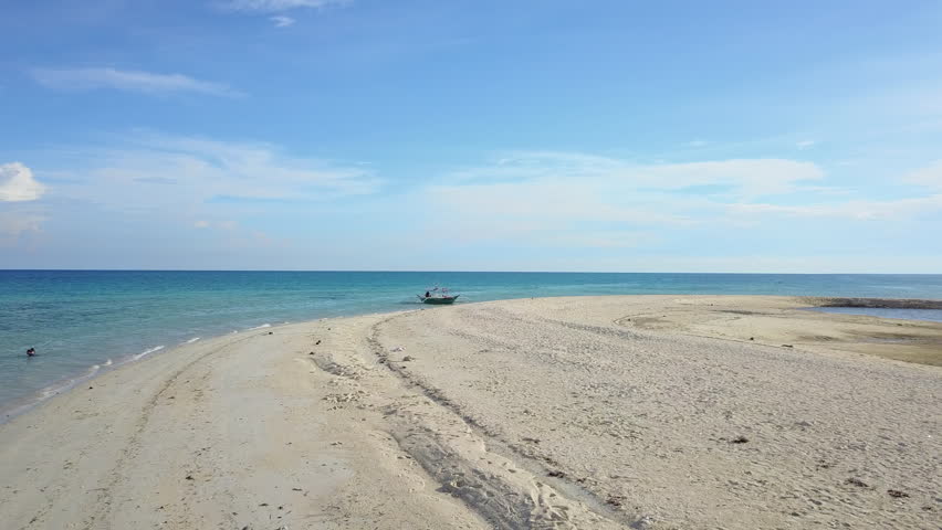 Fantastic deserted beach on Bantayam Island on a sunny day, Philippines,
