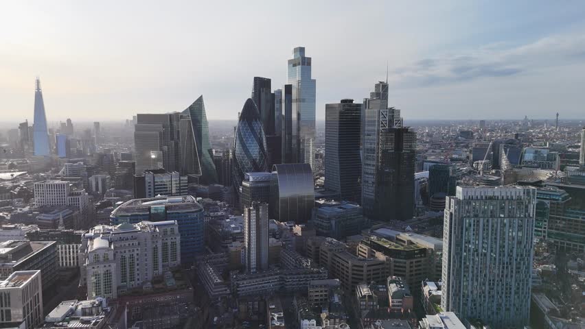 Skyscrapers London financial district skyline reverse aerial