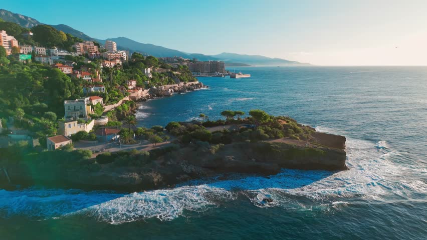 Aerial view of the French Riviera coastline between Nice and Monaco. Luxury villas line the Mediterranean Sea along the magnificent Cote d