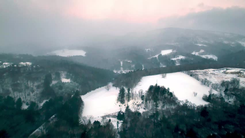snow on the ground and countryside near boone nc