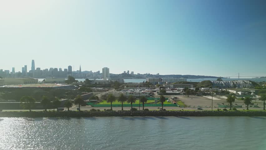 Pan drone shot of Treasure Island in the day with San Francisco cityscape in California, USA