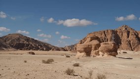 Explore the stunning rock formations and vast landscapes of the Sinai desert in Egypt under a bright blue sky - Powered by Shutterstock - Get 15% off with code: PIKWIZARD15