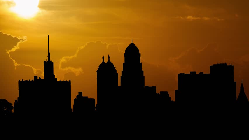 New York: Buffalo skyline at sunset, Time Lapse with Red Sun, Fiery Sky, and iconic Silhouette of Buffalo City Hall, USA