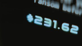 Increasing number of Dollars on screen, macro view - Powered by Shutterstock - Get 15% off with code: PIKWIZARD15