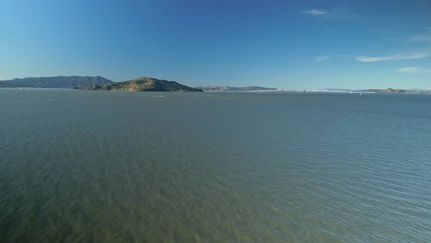 Parallax drone shot of Treasure Island in the day with North Pacific Ocean in California, USA