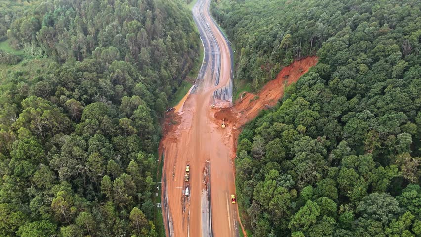 Drone peaks through clouds of Hurricane Helene to reveal devastating mudslide blocking Interstate 40 near Asheville, NC