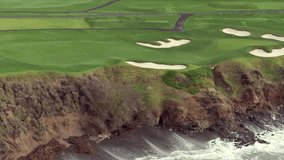 Golf course overlooking the ocean with sand bunkers near a cliff at Pebble Beach - Powered by Shutterstock - Get 15% off with code: PIKWIZARD15