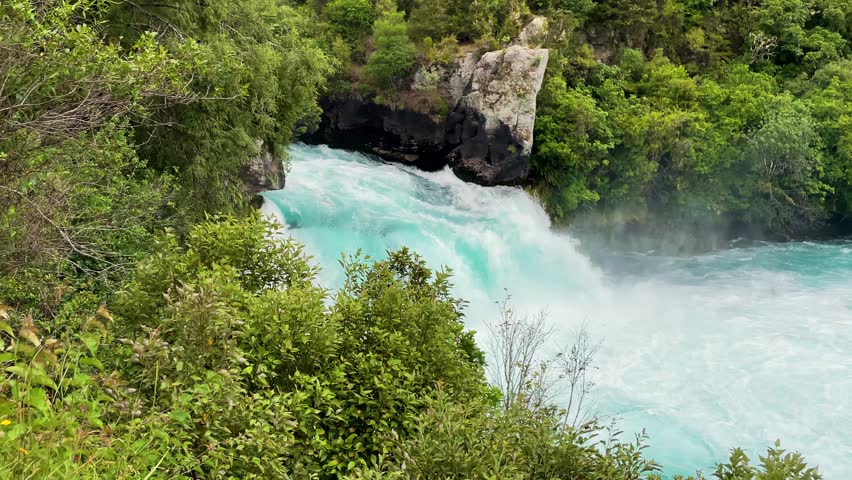 Dramatic canyon rapids of Huka Falls on Waikato River New Zealand