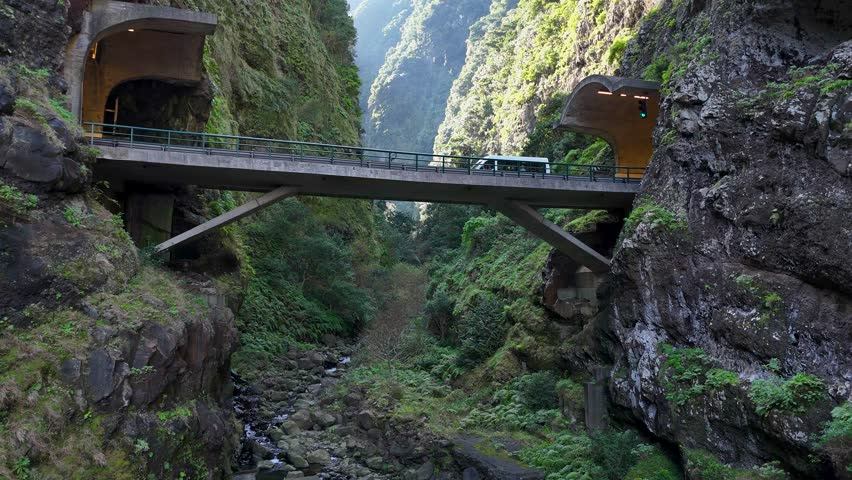 Drone View of Cars Stopping on Agua d'Alto Bridge to Admire the View of Ribeira do Inferno Gorge, Madeira, Portugal