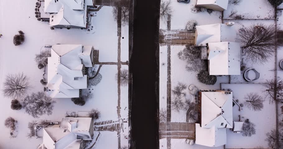 Suburban Neighborhood in America - Top Down Drone Shot on Cold Winter Day. Snow