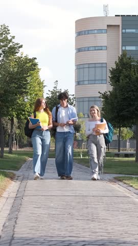 Engaging students walking and conversing together on a vibrant college campus